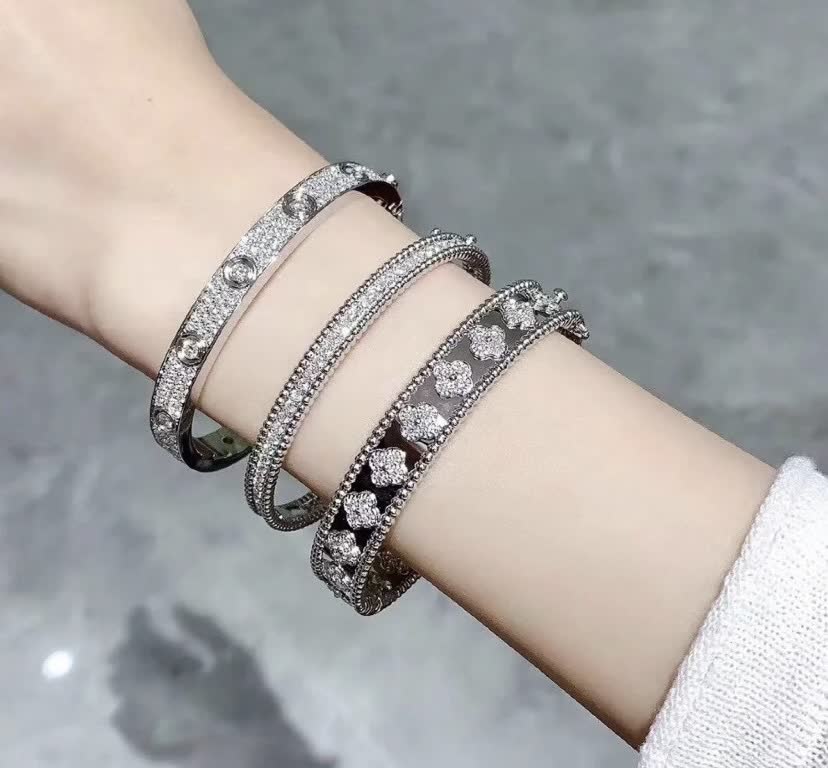 Van Cleef & Arpels Silver Diamante Flower Bangle Set Van Cleef & Arpels Silver Diamante Flower Bangle Set